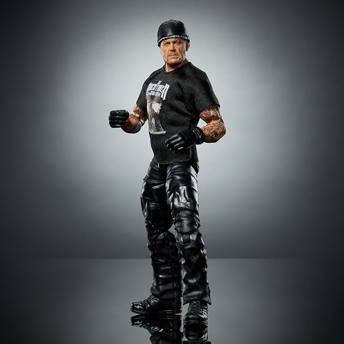 Mattel WWE Elite Action Figure & Accessories, 6-inch Collectible Undertaker with 25 Articulation Points, Life-Like Look & Swappable Hands - Figurio