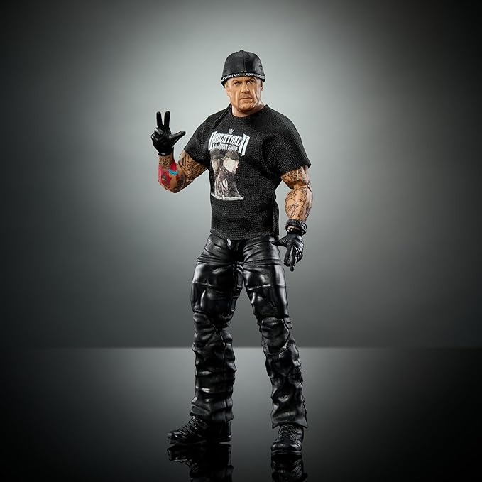 Mattel WWE Elite Action Figure & Accessories, 6-inch Collectible Undertaker with 25 Articulation Points, Life-Like Look & Swappable Hands - Figurio