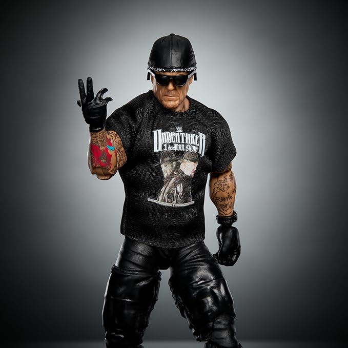 Mattel WWE Elite Action Figure & Accessories, 6-inch Collectible Undertaker with 25 Articulation Points, Life-Like Look & Swappable Hands - Figurio